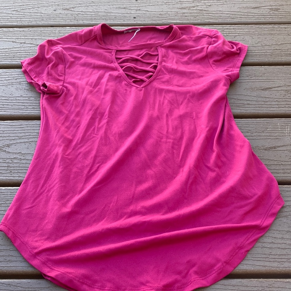 Medium shirt that opens down the middle.